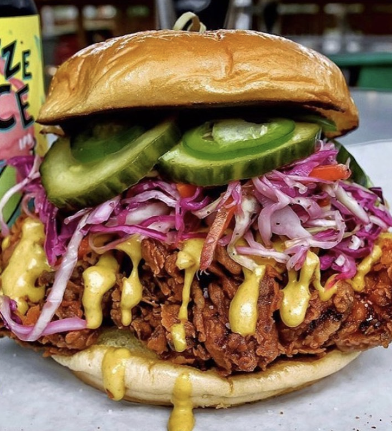 Dignowity Meats
1701 E Houston St, (210) 462-1496,  dignowitymeats.com 
Dignowity Meats top their signature chicken sandwich with vinegar slaw, jalapeños and house pickles. The Crazy Clucker is on a whole other level.  
Photo via Instagram / dignowitymeats