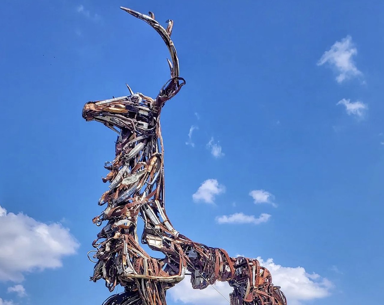 Giant Stag Made of Junk, Converse
4203 Loring Park, Converse, roadsideamerica.com
Built from various rusted metal parts — fenders and typewriters included — this Florentino Narcis creation stands 40 feet tall in the midst of a neighborhood in Converse.
Photo via Instagram / therefinedhomellc