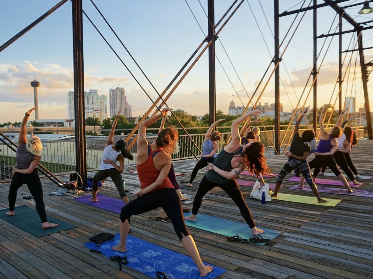 Take an outdoor yoga class with Mobile OmVarious Locations, mobileomtx.com Mobile Om’s motto is “yoga without bounds,” and in practice, it’s just like it sounds — mobile yoga classes in unconventional outdoor spaces. One of those boundless studios is on top of the Hays Street Bridge overlooking the downtown skyline, where Mobile Om got its start, but the roving studio offers classes at other classic SA locations including Confluence Park and the Mission Marquee Plaza.