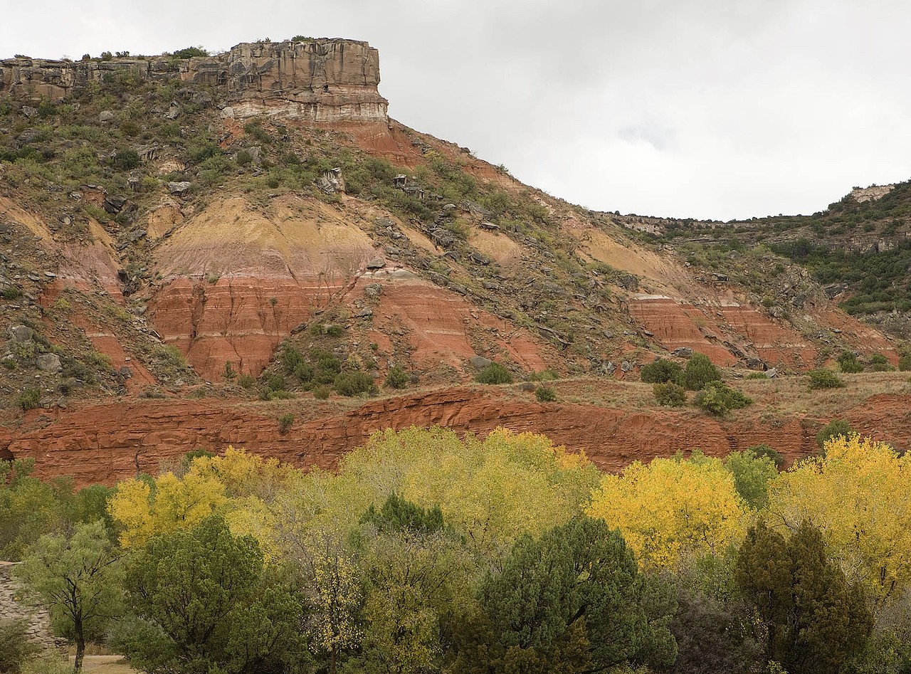 Palo Duro Canyon State Park
11450 State Hwy Park Rd 5, Canyon, tpwd.texas.gov
Need an excuse to go on a road trip? Let Palo Duro be reason enough for you. Located in the Panhandle, this state park is home to the second-largest canyon in the U.S. The canyon’s cottonwood trees turn yellow in the fall, competing in brilliance with the reddish rock of the canyon.
