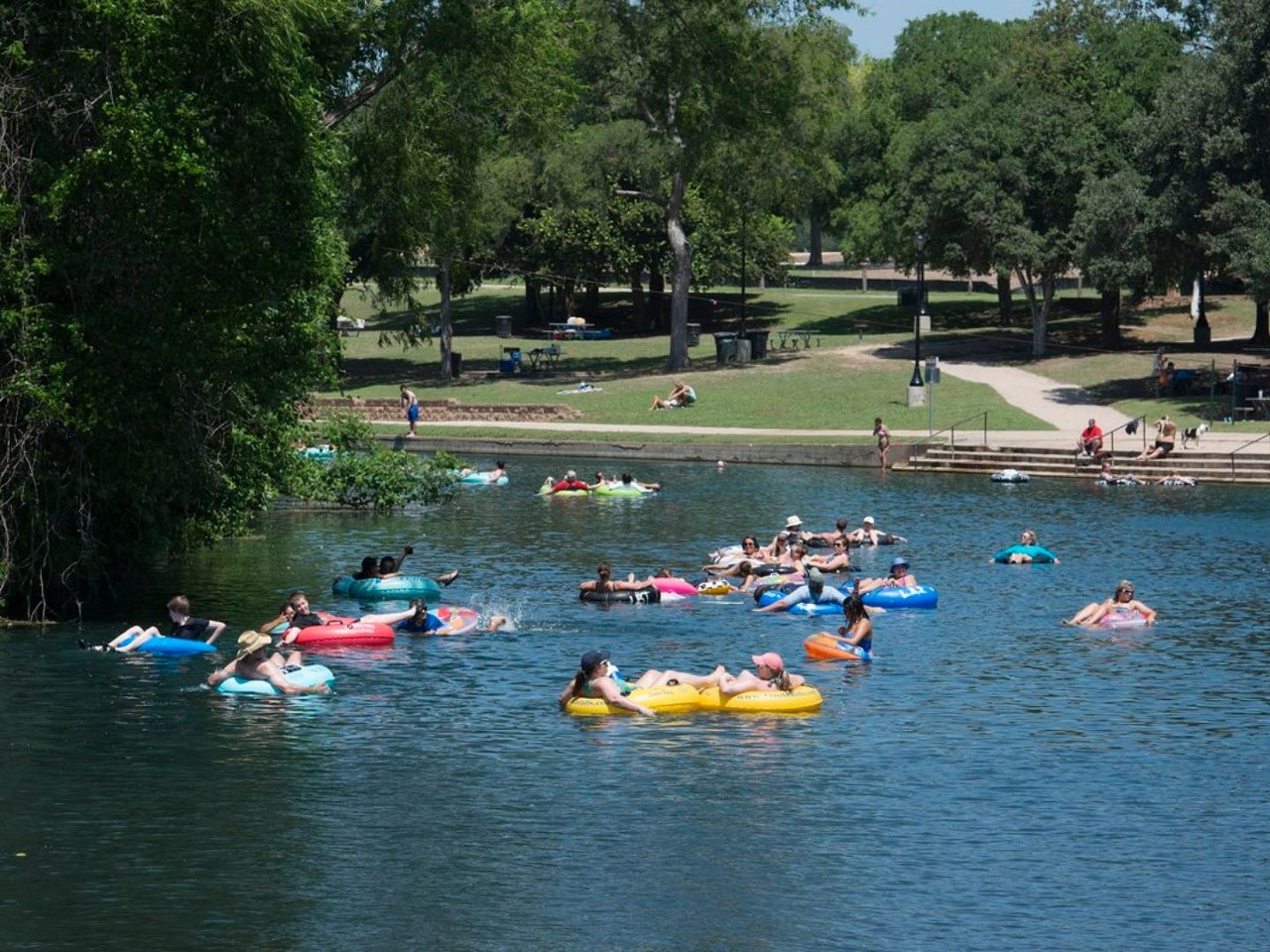 Comal River
164 Landa Park Drive, New Braunfels, (830) 387-4408, playinnewbraunfels.com
What better way to spend the day than a relaxing float down the Comal River with your best friends and some tunes? After it emerges from the ground at Comal Springs, the Comal River becomes the shortest navigable river in Texas before feeding into the Guadalupe.
