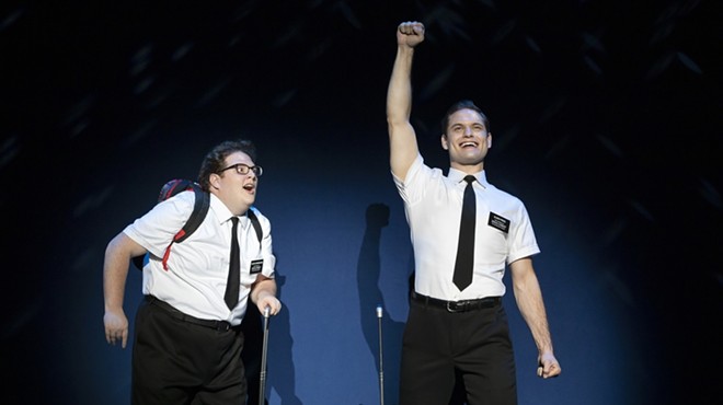 The Book of Mormon follows Elder Kevin Price (Sam McLellan) as he's begrudgingly paired with socially awkward Elder Arnold Cunningham (Sam Nackman) for a mission trip to Uganda.