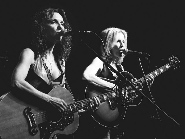 A bittersweet night: Lisa (left) and Roberta Morales rockin’ it at Sam’s. - FRED JIMENEZ