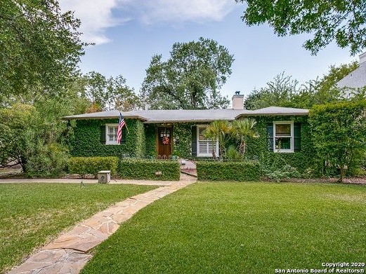 A Cute Home for Sale in San Antonio's Terrell Hills Neighborhood Is Completely Covered in Ivy