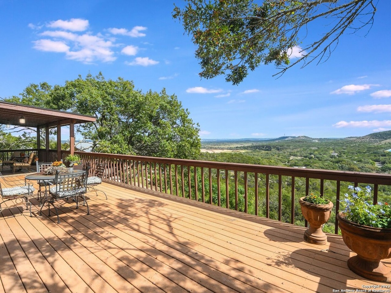 A log cabin compound for sale in San Antonio is built on the county's