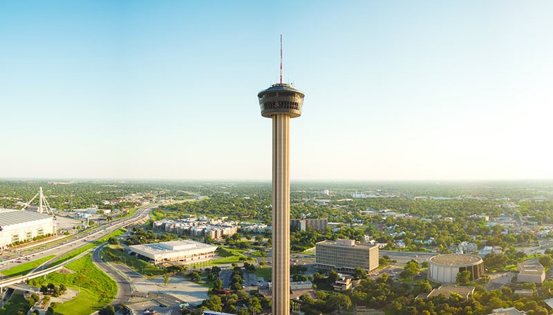A room with a view and a drink at Tower of the Americas. - COURTESY