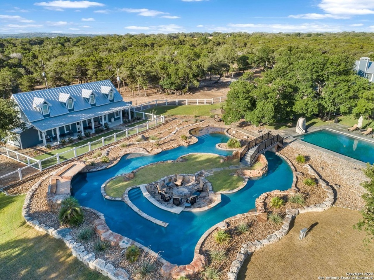 A San Antonio-area house with its own private lazy river underwent a $1.5 million price cut