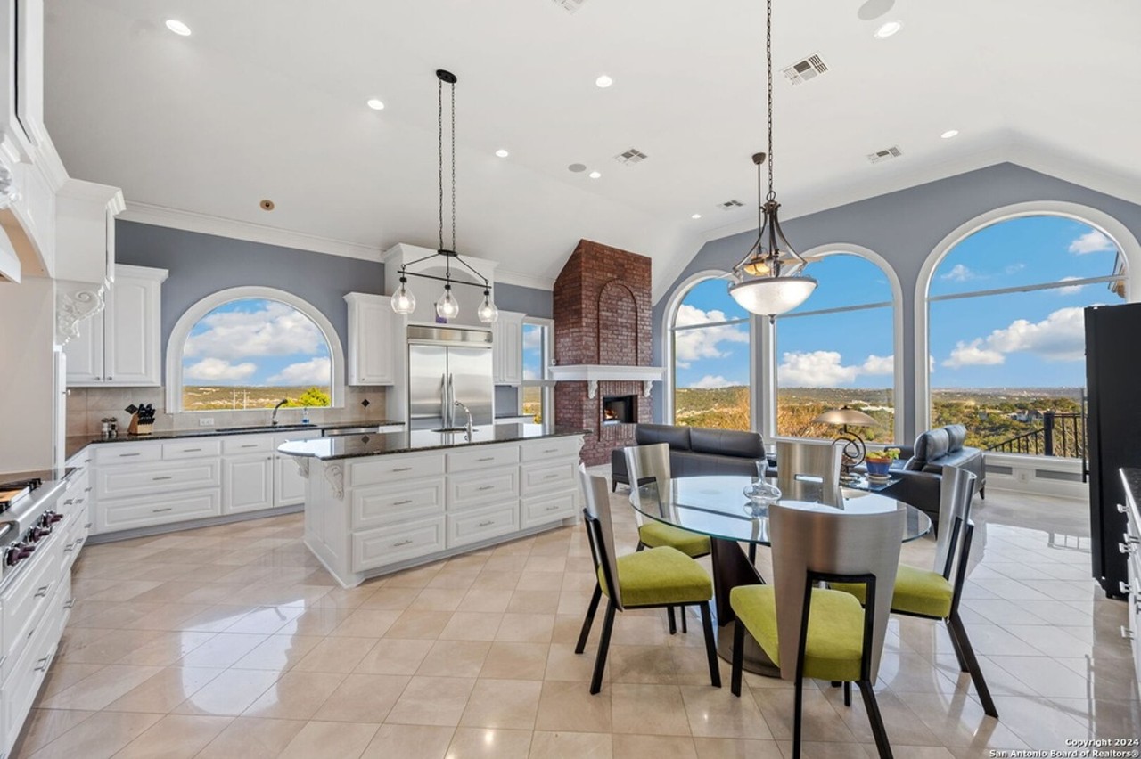 A San Antonio home for sale has windows offering panoramic Hill Country views