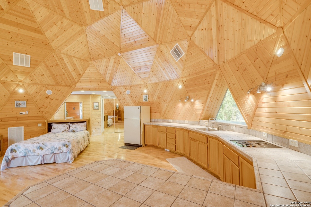 A triple geodesic dome home near San Antonio is back on the market with a $100,000 price cut