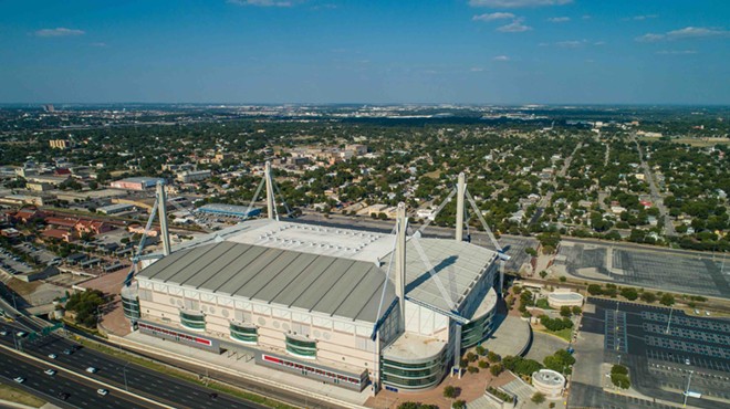 The Spurs 50th anniversary game and WWE Royal Rumble set attendance records at the Alamodome.