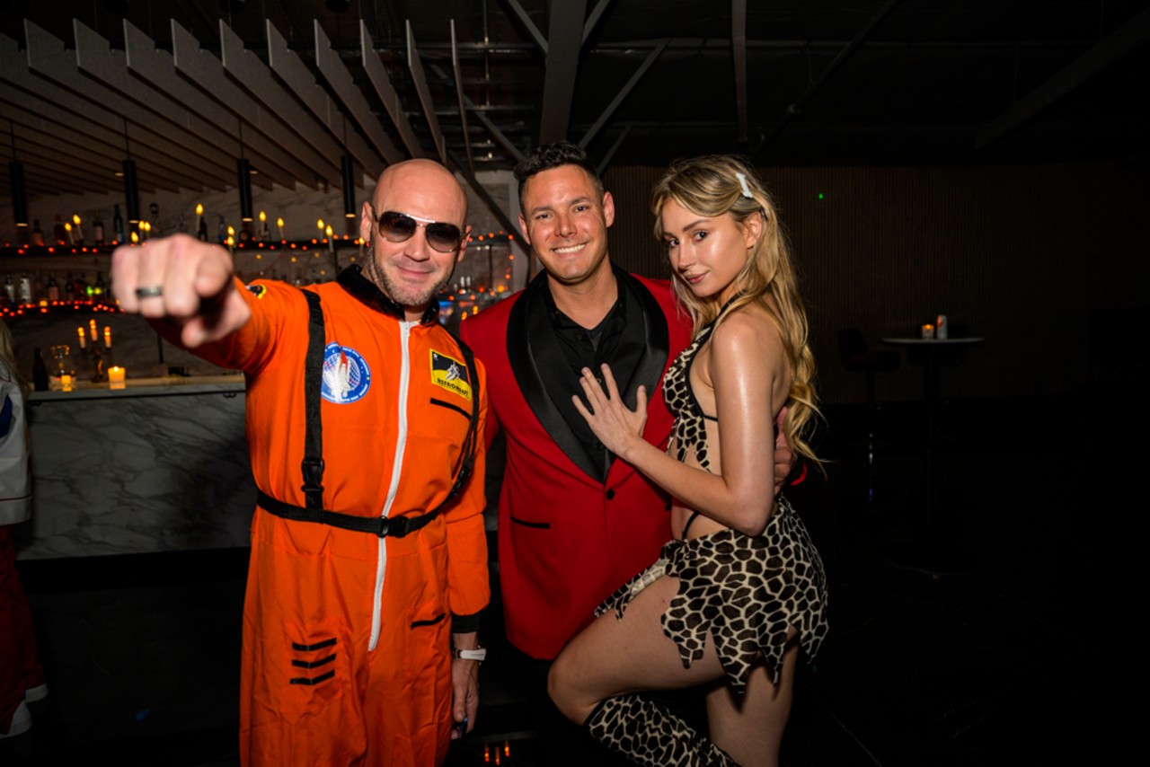 All the boo-tiful people at the Prestige Motorsports Halloween party