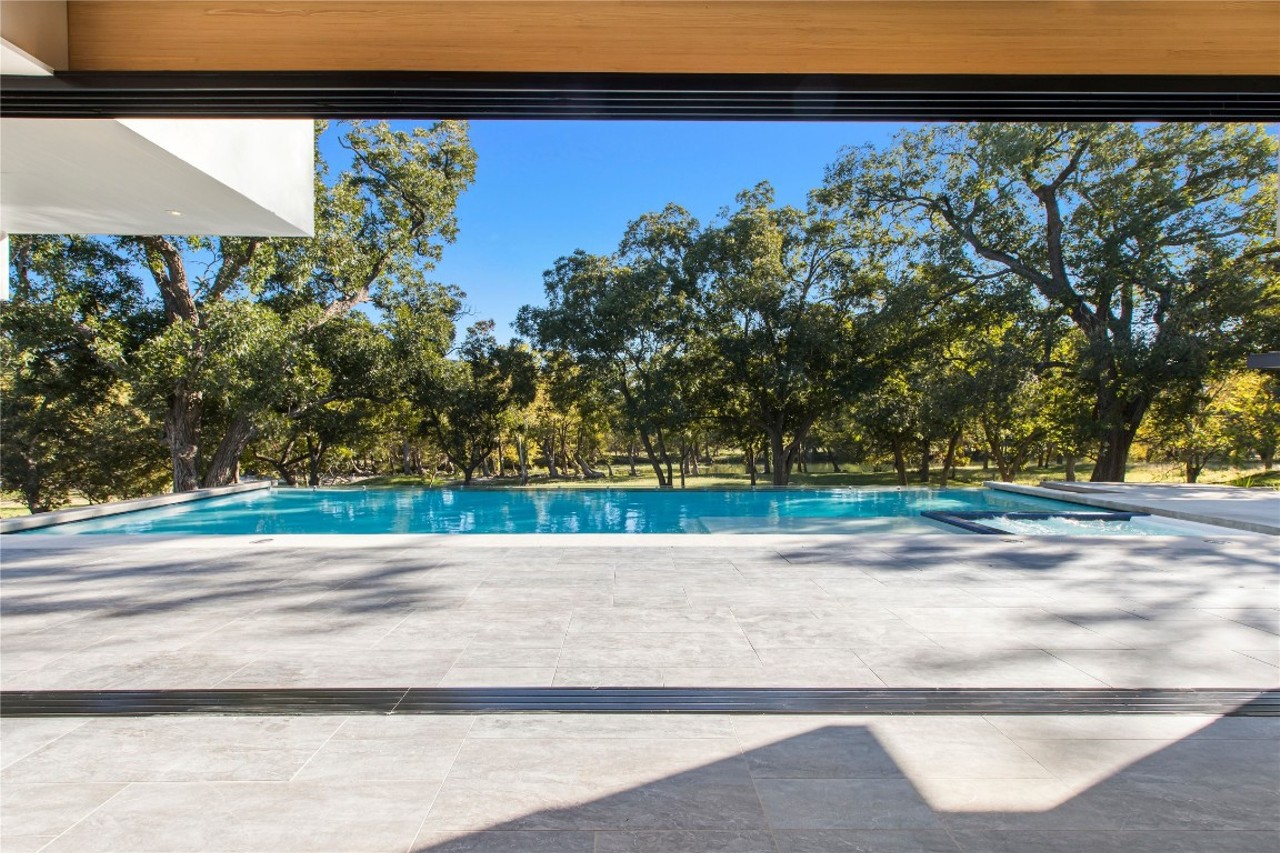 An all-concrete home on the Guadalupe River called the 'Monolith House' is now for sale
