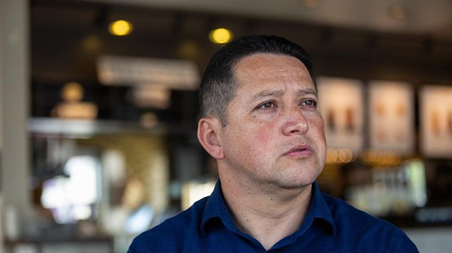 District 23 Rep. Tony Gonzales speaks with a reporter at a Starbucks in San Antonio on Aug. 24, 2022.