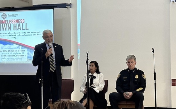 Bexar County District Attorney Joe Gonzales addresses the crowd at a recent public safety forum attended by SAPD Chief William McManus.