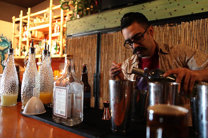 Beverage director Roy Guerrero's having fun with his menu - LINDA ROMERO