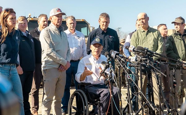 Texas Gov. Greg Abbott holds a press conference in Eagle Pass earlier this month with other Republican governors.