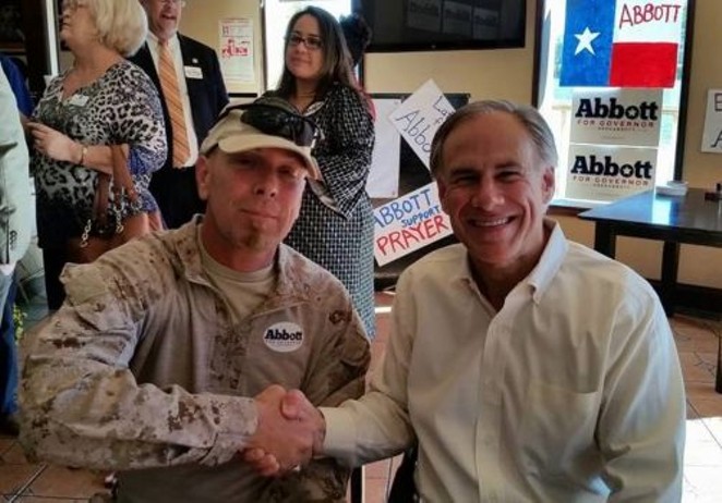Kevin Lyndel Massey poses with Republican gubernatorial candidate Greg Abbott at an Brownsville campaign event on October 16. - Facebook