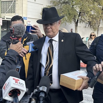 Former District 10 Councilman Clayton Perry tries to outrun the media after council voted to censure him in November 2022.