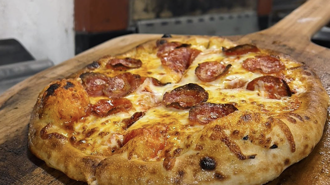 Woodfire pizza outfit Doughboy will give away 150 free pepperoni pizzas Friday starting at noon.