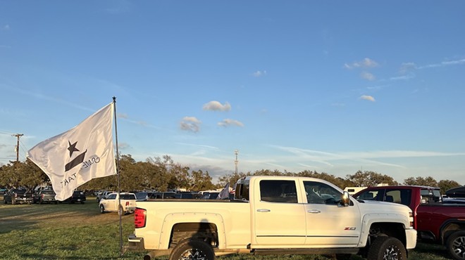 A Come and Take It flag flutters from a "Take Our Border Back" convoy member's truck Thursday in Dripping Springs.