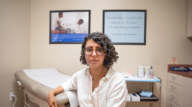 Dr. Amna Dermish, chief operating and medical services officer for Planned Parenthood of Greater Texas, poses for a portrait in an exam room of a Planned Parenthood facility in Austin on Aug. 8, 2023. Credit: Montinique Monroe for The Texas Tribune
