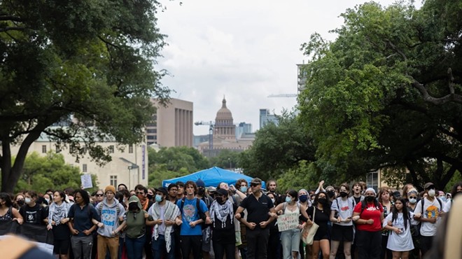 Protesters link arms at the University of Texas at Austin during a pro-Palestine demonstration on April 24, 2024.