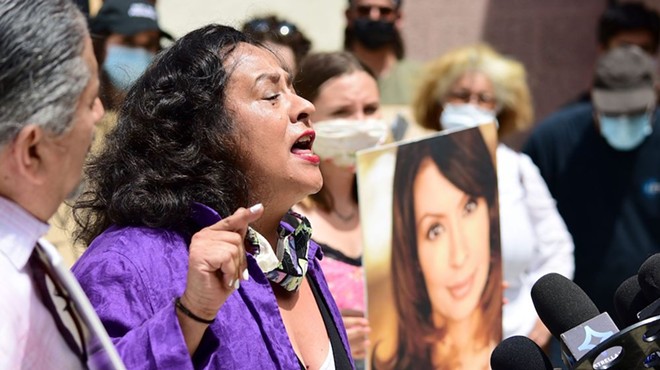 Actress Ingrid Oliu speaks at a press conference demanding justice for her Stand and Deliver co-star Vanessa Marquez.