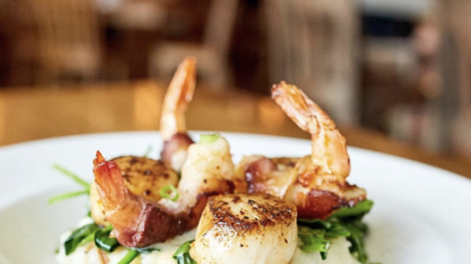 Seared Georges Bank scallops and applewood bacon-wrapped shrimp are one of the entrees served at Fish City Grill locations.