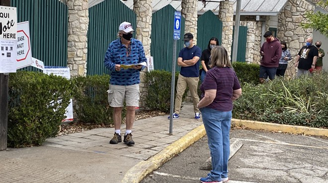 San Antonians line up outside of the Lion's Field voting site during early voting.