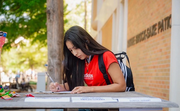 Makayla Ortega, 19, a student at University of Texas at Arlington, registers to vote at the UTA campus on Sept. 10, 2024.