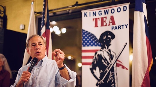 Gov. Greg Abbott speaks last month at a Kingwood Tea Party event. The governor has made frequent massless appearances in recent months.