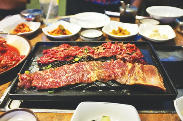 Grilling your own meats at Kiku Garden