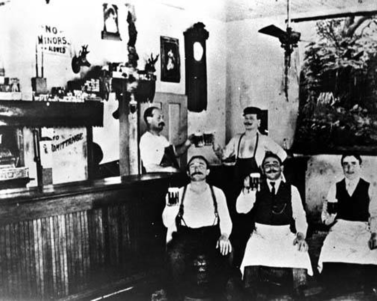 Peter Brothers Brewery and Saloon, San AntonioThis 1895 photo from the San Antonio-Express News’ collection shows the Alsatian American owners John Peter (seated on left) and Gus Peter (at center) of this beer-lovers’ paradise along with three other unidentified men.
