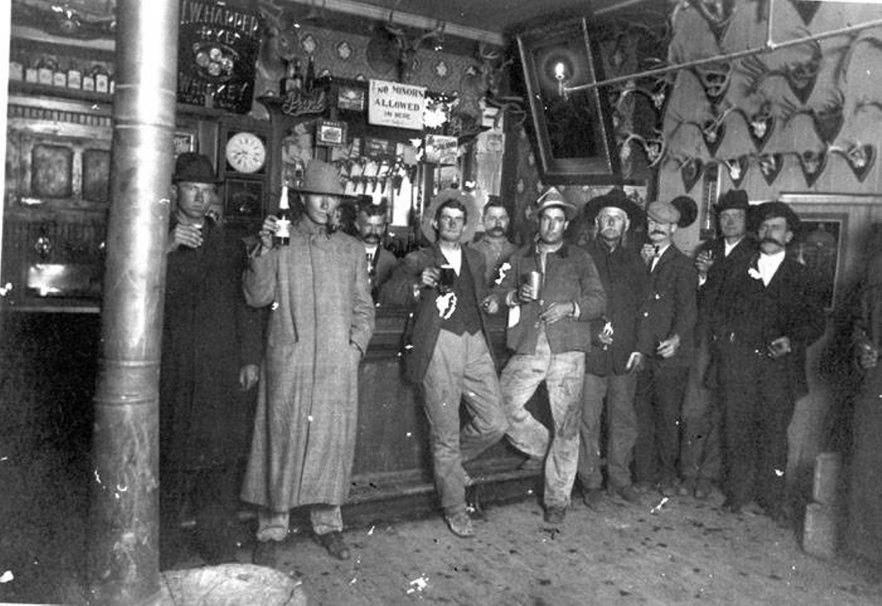 LaCoste Exchange, LaCosteThis photograph from somewhere between 1910 and 1912 shows patrons in a saloon owned by J.V. Reicherzer holding up bottles and beer mugs. LaCoste has since been absorbed into San Antonio’s northern sprawl.