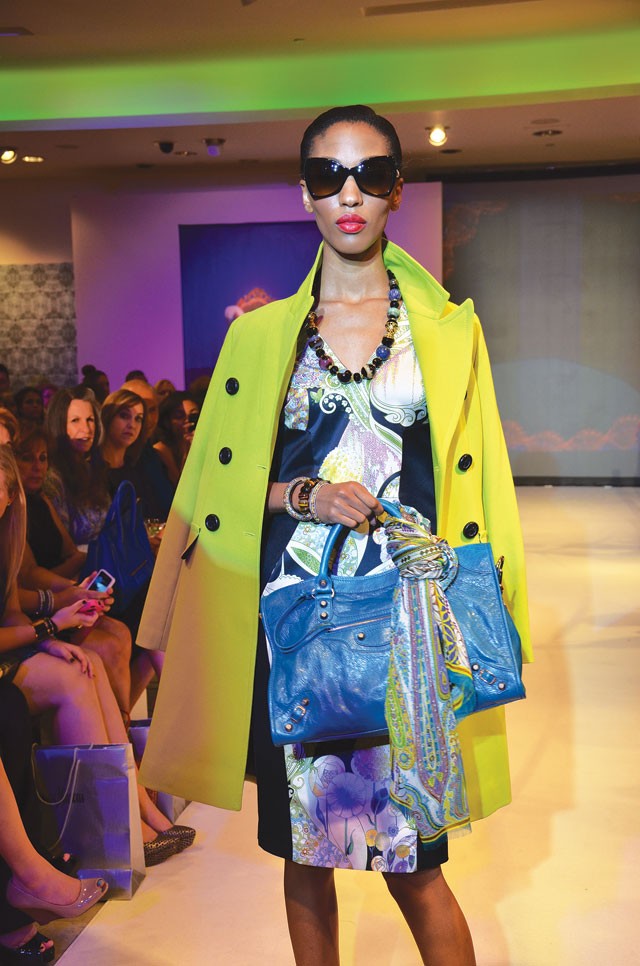 Illustrating the digital print trend for Fall 2012 at Neiman Marcus, Raven Forrester models a dress by Etro, a jacket by Trina Turk, and a bag by Balenciaga. - PHOTOS BY BRYAN RINDFUSS