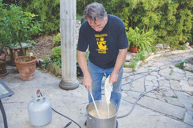 Jerry Lockey cooking a batch of beer - SCOTT ANDREWS