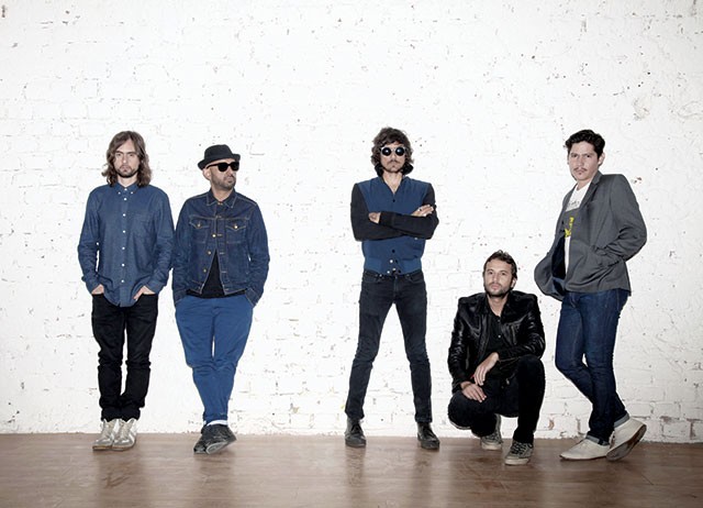 León Larregui (center) and his bandmates of two-time Latin Grammy winners Zoé - COURTESY PHOTO