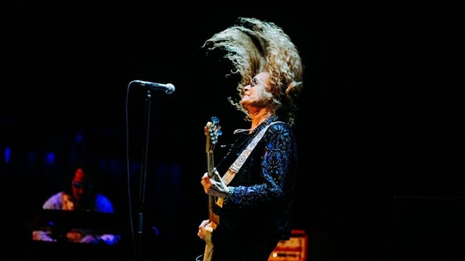 Former Deep Purple member Glenn Hughes shows his rock moves during a 2023 show in San Antonio.