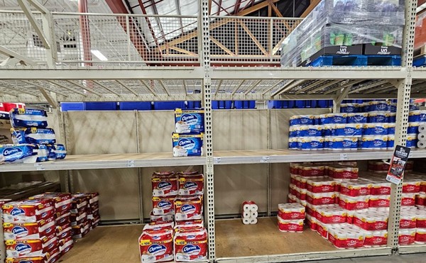 X user @AnarchoDarling posted photos of barren shelves in the toilet paper aisle at the H-E-B at Bandera and Loop 1604 on Tuesday.