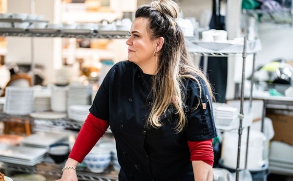 Chef-owner Braunda Smith of Lucy Coopers Ice House stands in the kitchen of her restaurant.