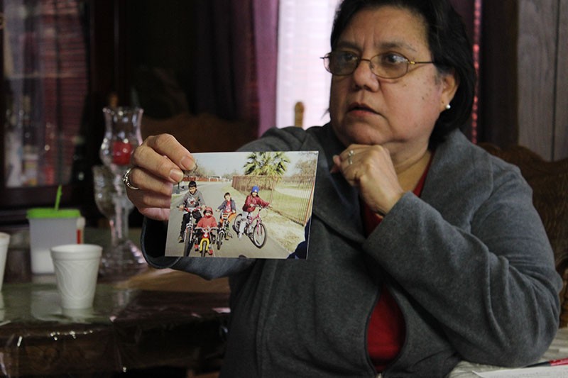 Mary Flores recalls happier times during her 38 years at Mission Trails mobile home park. Only a handful of families remain there now. - Adriana Ruiz