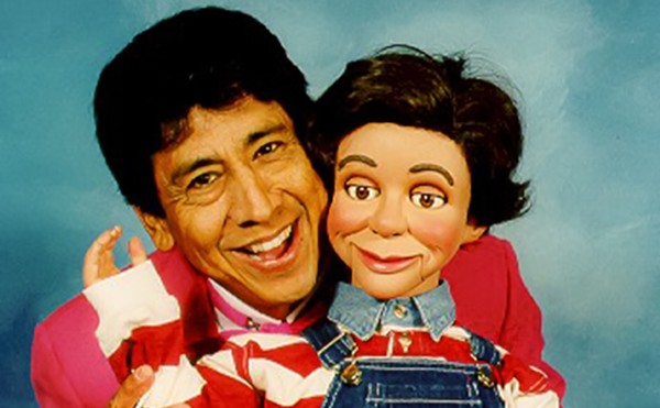 Nacho Estrada and his dummy Maclovio pose for a promo shot.