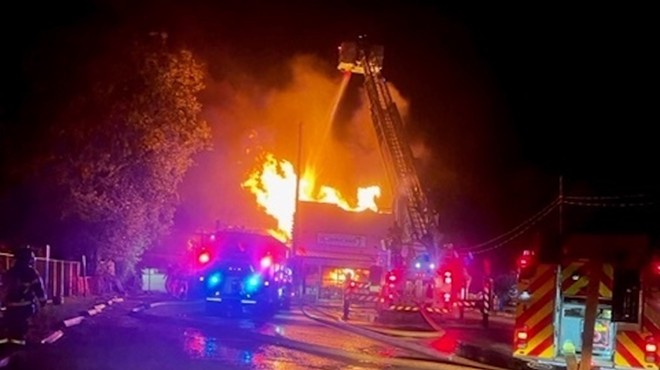 Emergency crews battle the Nov. 14 blaze at Cancun Mexican Restaurant.