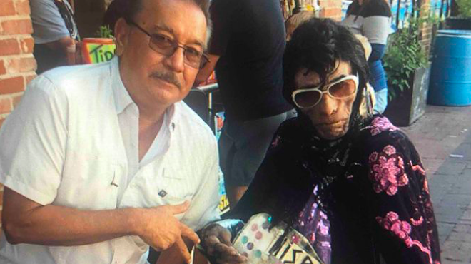 Downtown street performer Hispanic Elvis, pictured here with his brother, George Cisneros, has died at age 76.