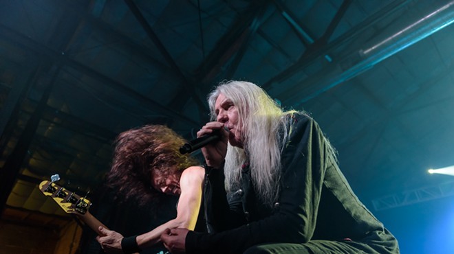 Saxon frontman Biff Byford belts it out during a San Antonio performance while bassist Nibbs Carter holds down the low end.