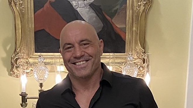 Podcaster and comic Joe Rogan poses in the Texas governor's mansion after his relocation to Austin.