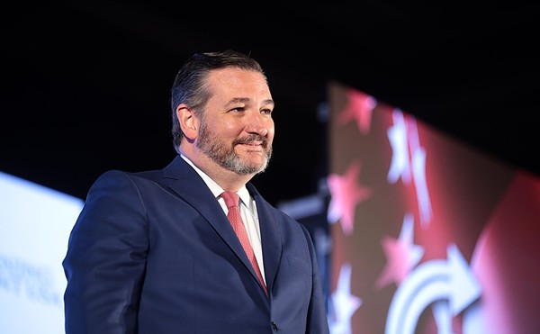 U.S. Sen. Ted Cruz smirks from the stage at a 2019 event hosted by conservative group Turning Point USA.