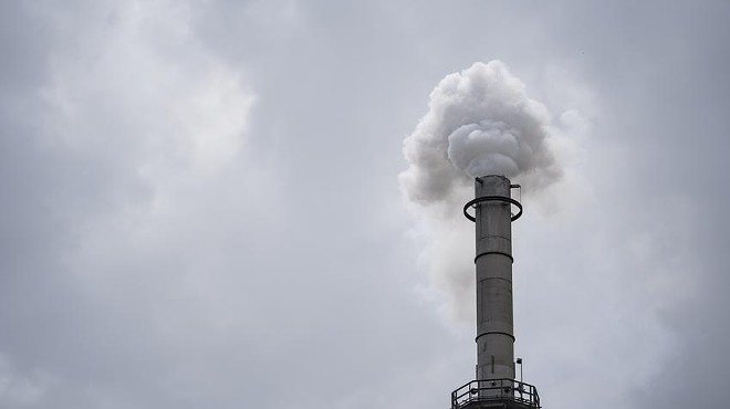 Smoke is released from a power plant in San Antonio in August. The power grid's failure during a February winter storm spurred state lawmakers to formalize the Texas Energy Reliability Council, a 25-member body tasked with fostering communication and planning to improve how the grid functions.
