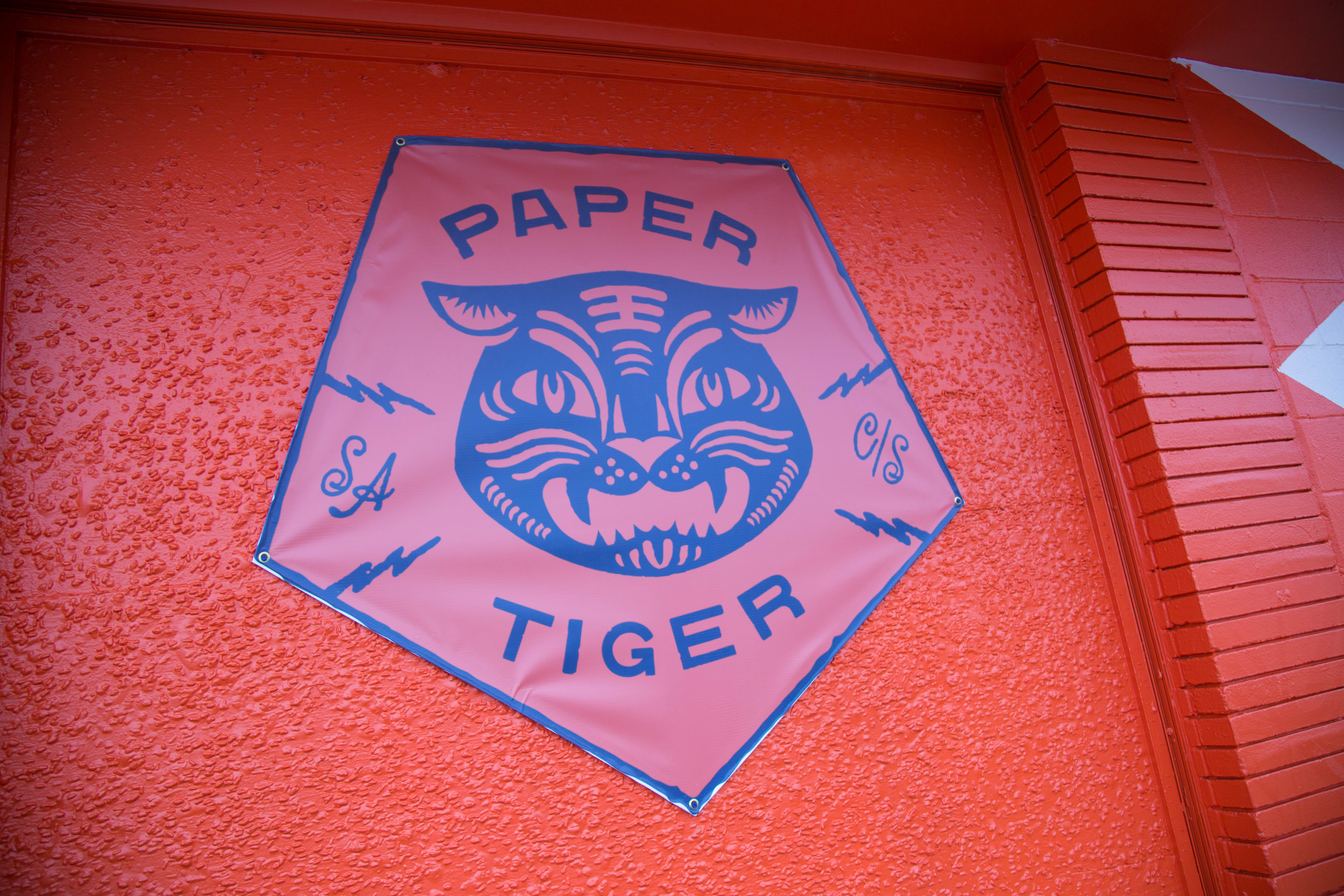 Paper Tiger’s new digs feature a papel picado banner. - LINDA ROMERO