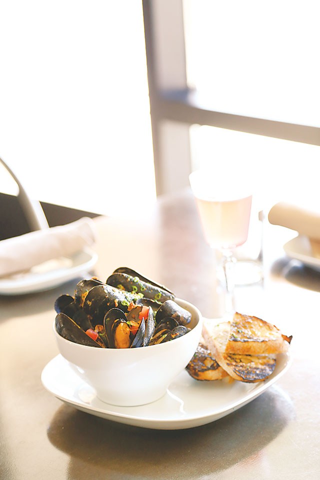 P.E.I. mussels and chorizo, with orange-habanero broth - ANA AGUIRRE